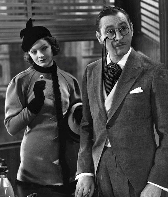 Myrna Loy and John Barrymore in Topaze